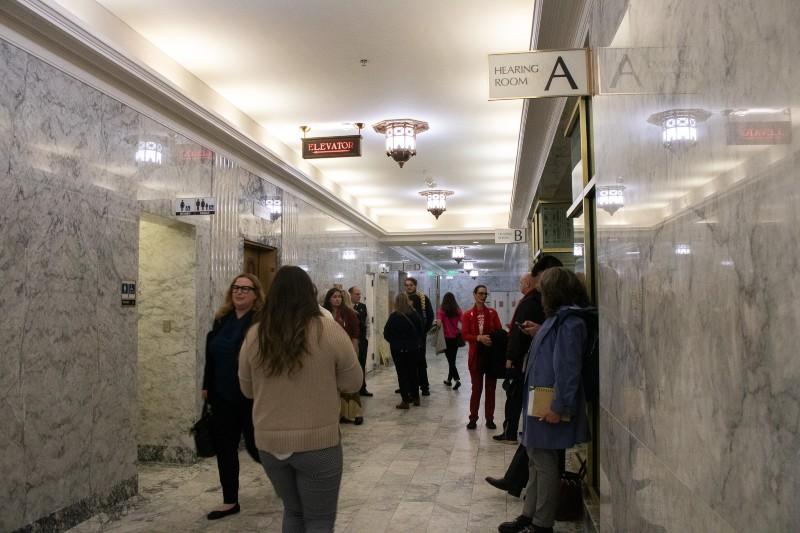 Advocates mingle in the hallways of the Washington state legislative building